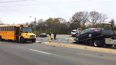 Two people injured in multi-vehicle crash involving school bus in front of Hyde Park school